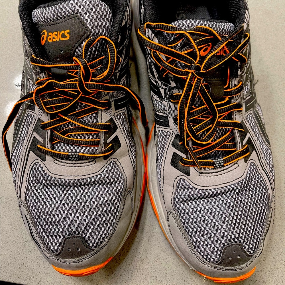 Men’s ASICS GUC sneakers.